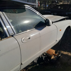 Used XJ Sovereign drivers door complete